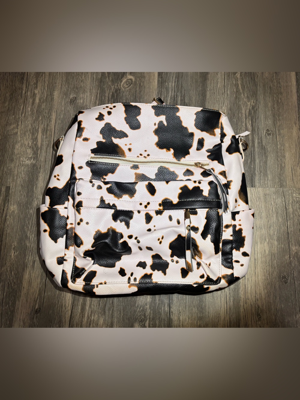 Cow Print Backpack with Front Zip Pocket